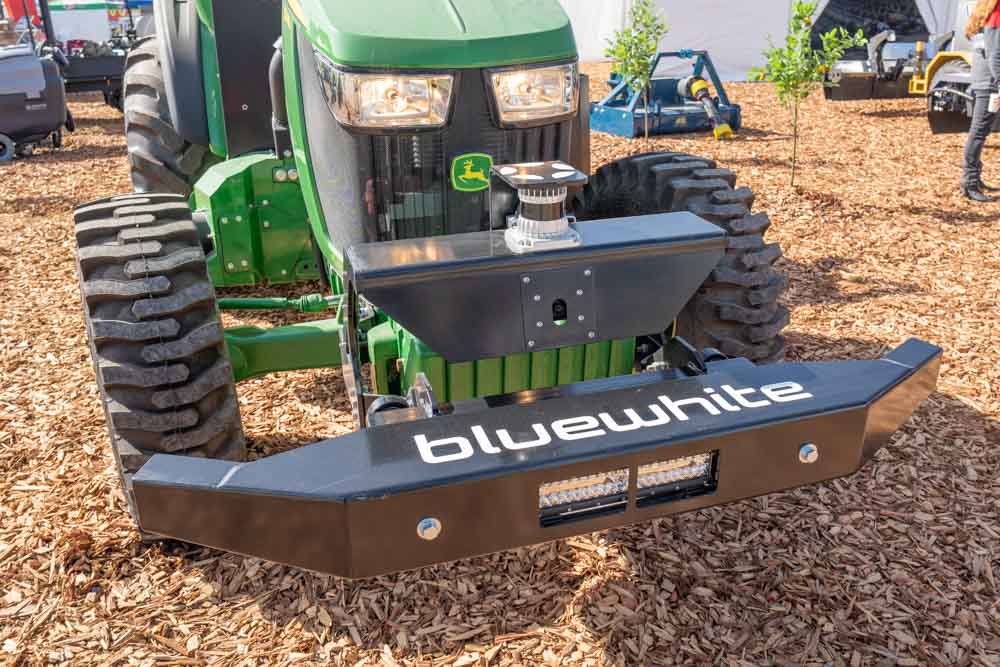 front bumper of a john deere tractor that's been converted to an autonomous tractor with BlueWhite technology.