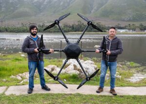 (From left to right) Pieter Van Zyl, Mechatronics Engineer, and Andries Louw, co-founder, director and chief pilot, with the AirSeed Drone. | Source: AirSeed Technologies