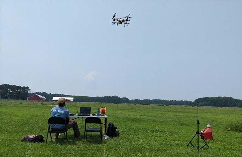 drone flys above observer